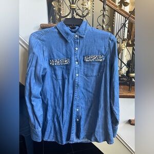 Chico’s Blue Jean Long Sleeve top with Rhinestones on front 2 pockets.Size 0EUC